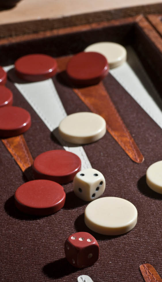 Still life with a backgammon game board.